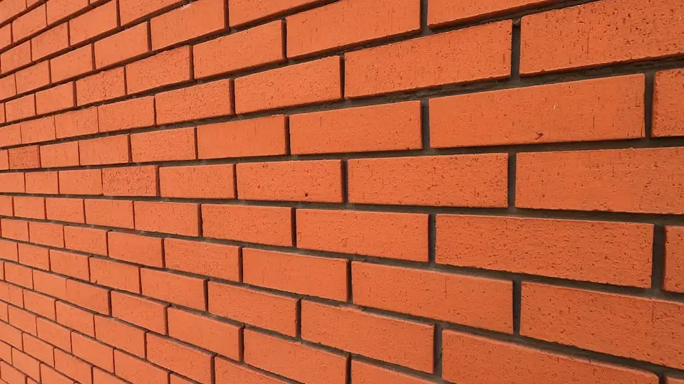 Red coloured brick wall clad design