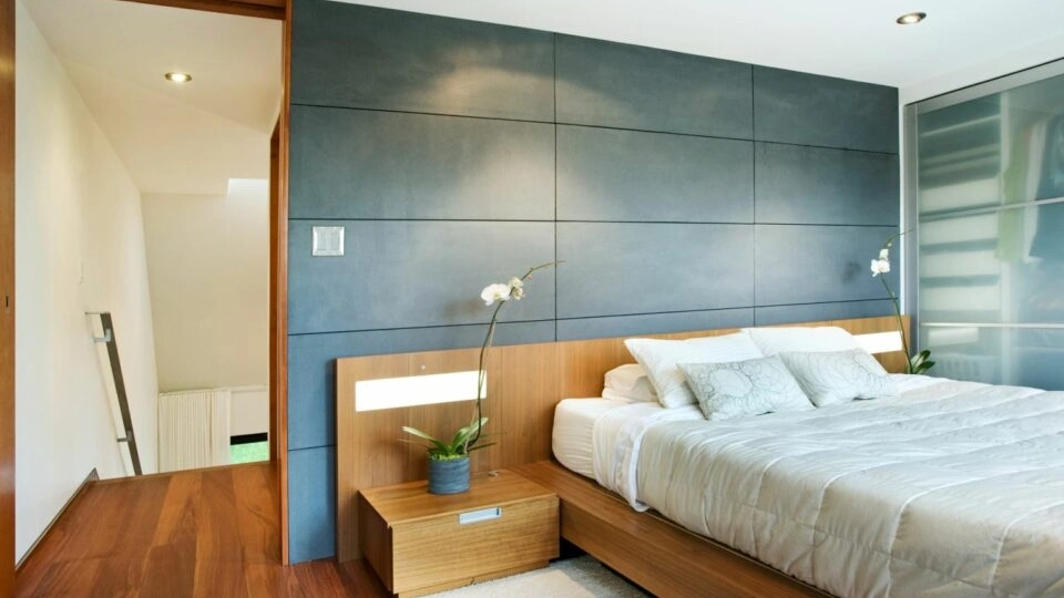 Interior wall cladding in bedroom with fibre cement 