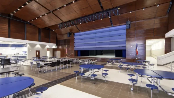 Skyfold premium vertically retractable wall system in a conference hall