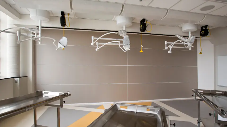 grey skyfold partition in a hospital lab with advanced equipment