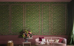 living room with pink sofa and a beautiful wallpaper, green tropical wallpaper in pink panelling, designer wallpaper for room
