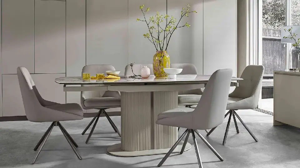 white table with swivel chairs