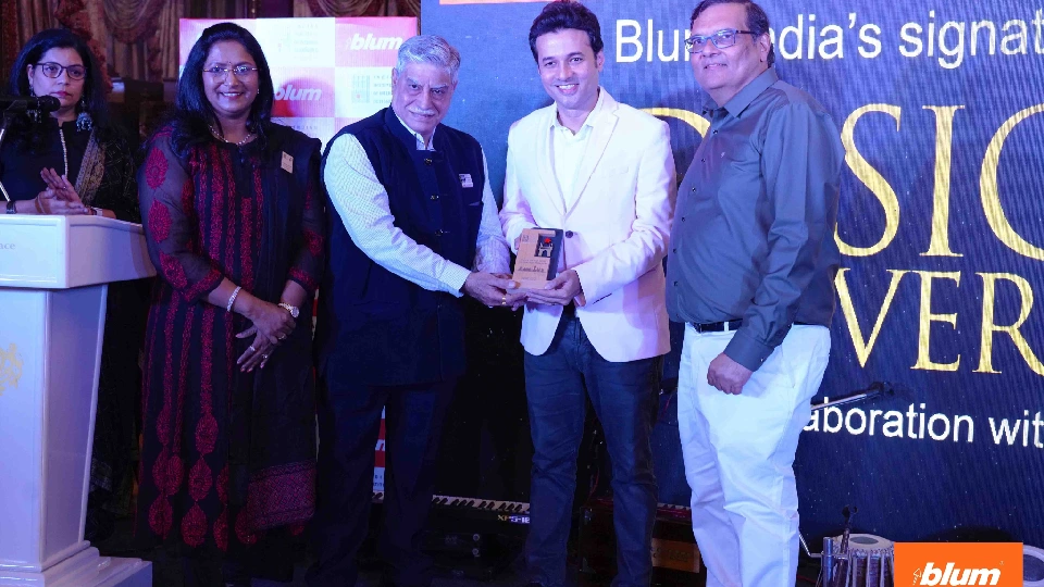 people giving and excepting awards at Blum India design event 2025