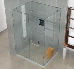 Jaquar shower enclosure - frameless IARA series, one fixed glass and openable door on the front and one fixed glass on the side covered with a roof on the top