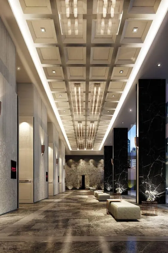 High ceiling with ceiling design and heavy lighting