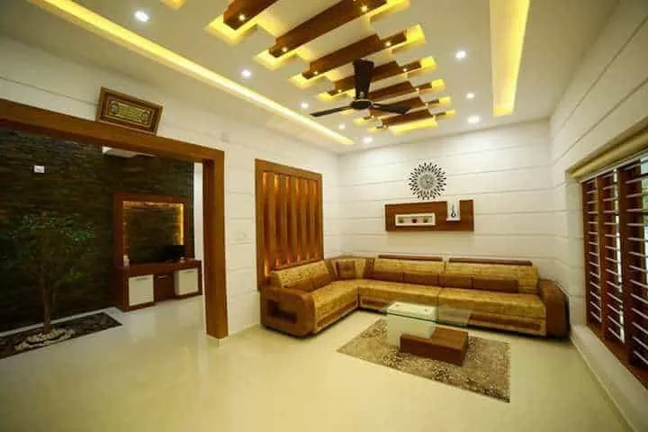 White and brown false ceiling with lights.