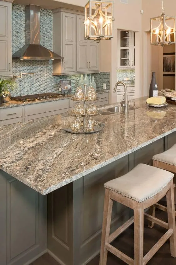 grey textured granite countertop designs for kitchen with light coloured interiors