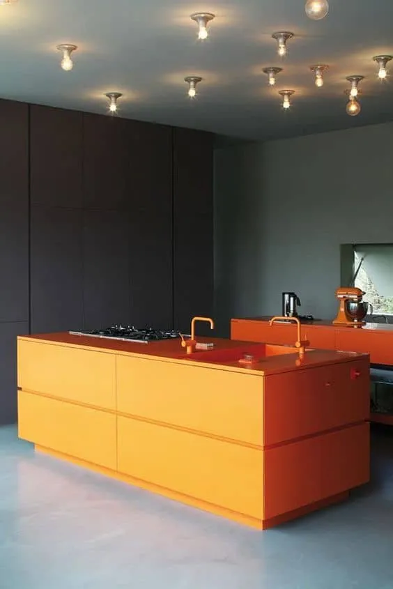 orange countertop in a black kitchen