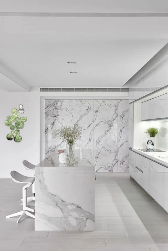 white quartzite countertop for a white kitchen