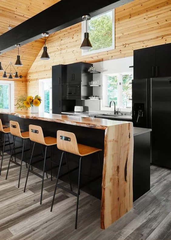 wooden countertop with black table, cabinets, and interiors
