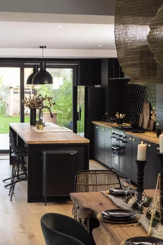 black kitchen interiors with wooden countertop designs. 