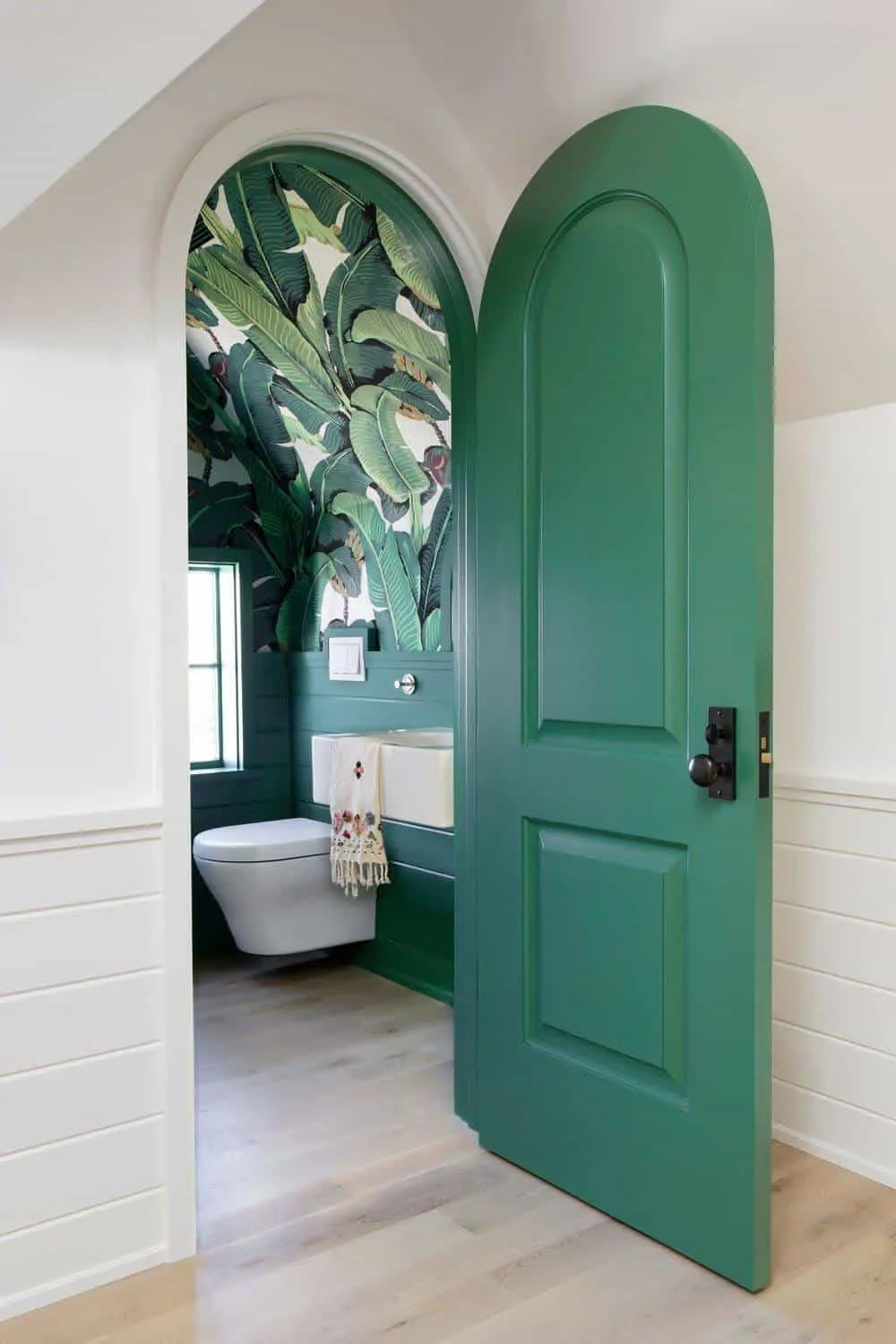 green arched bathroom wooden door design for a modern home