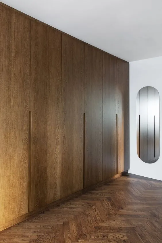light brown multiple door wardrobes with mirror on the wall