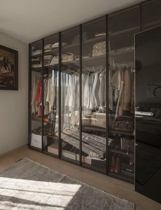 black framed glass wardrobes with interior design, lights, and drawer system