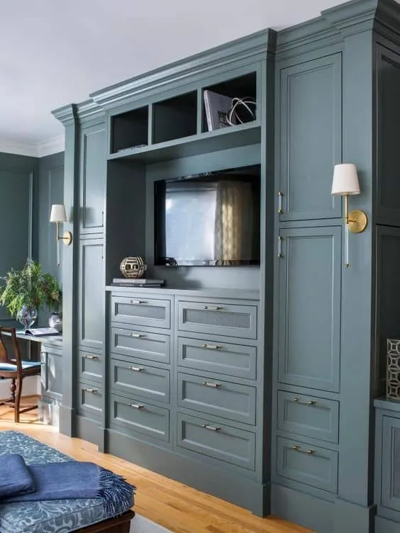 grey closet with TV and bottom drawers