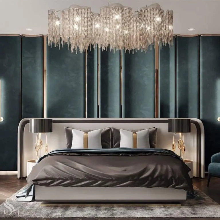 designer bed with gol accents on headboard and bedback wall