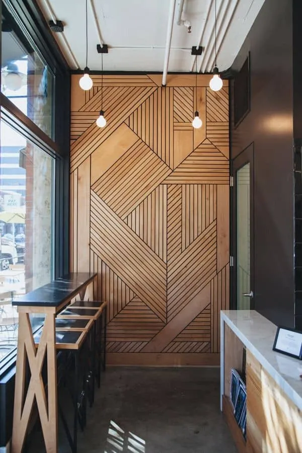 plywood wall design with carved lines