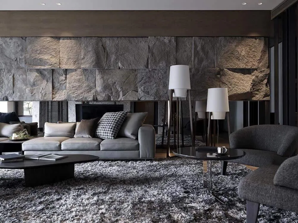 dark gey natural stone wall design for living room 