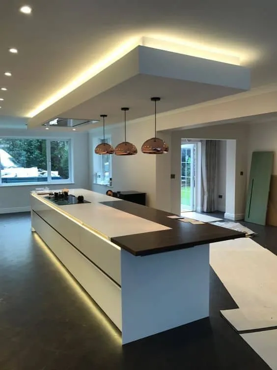 suspended ceiling with hanging lights in kitchen