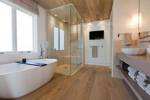small wooden bathroom with a beautiful floor and bathroom ceiling design