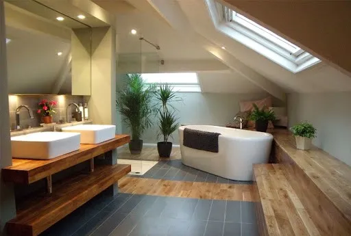 small bathroom with a beautiful floor and sloped ceiling design