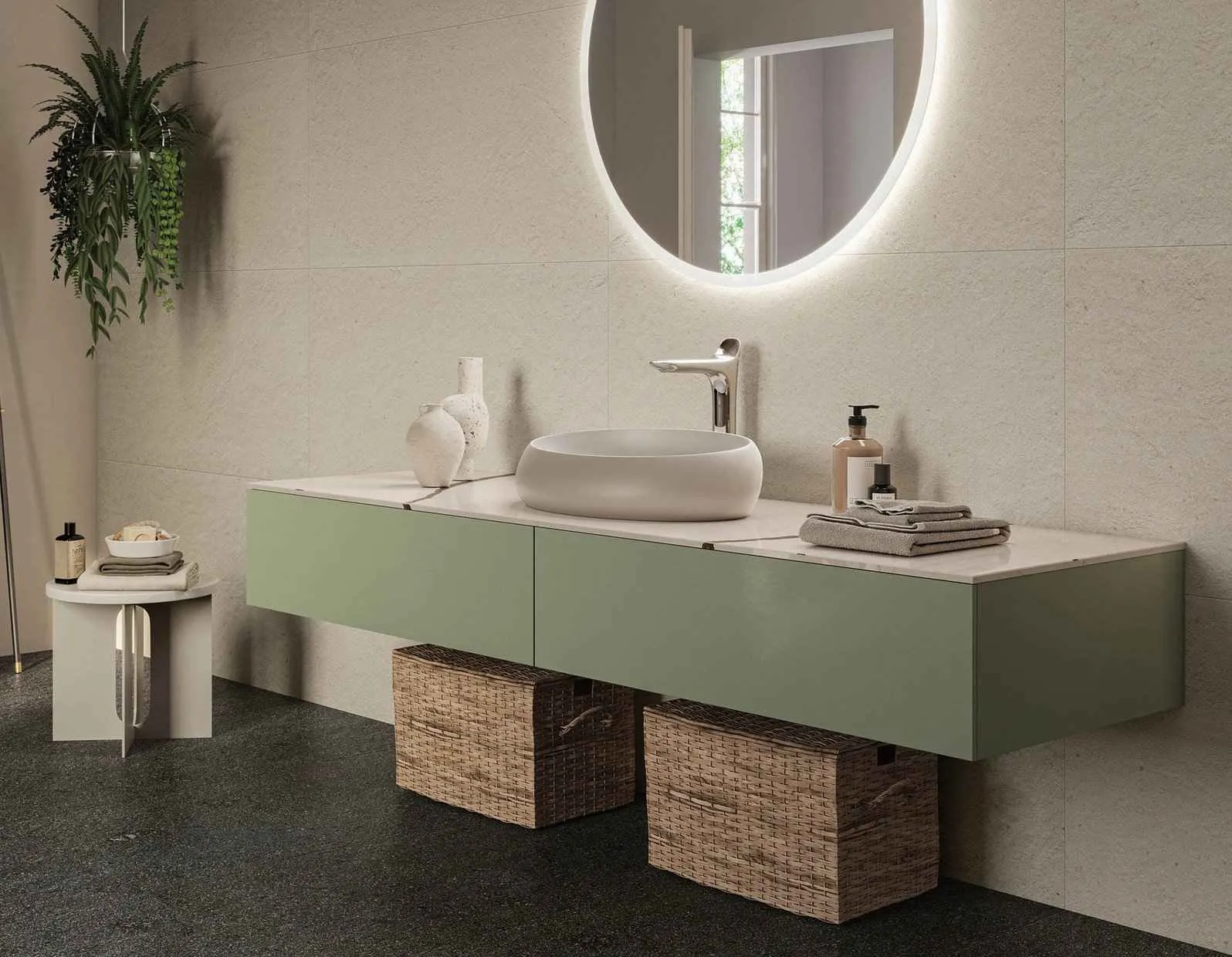 beige bath ،e with green cabinets, round mirror with LED lights, washbasin and wall tiles