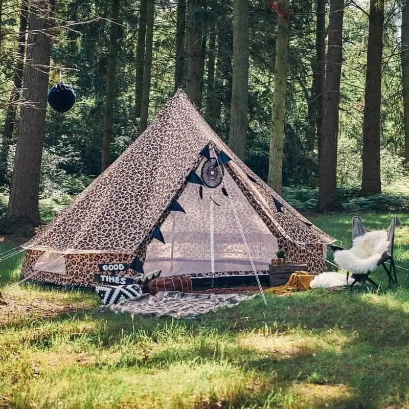 Glamping tent setup in house backyard