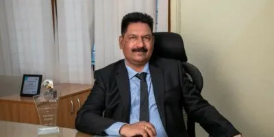 Mr. K O Abraham, Managing Director & Chairman, Mysore Light & Interiors Private Limited, drywall, lighting, and turnkey interiors contractor in Bangalore, Interior contracting company