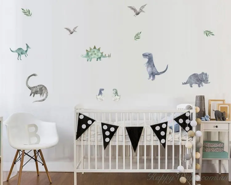 nursery with a wooden crib, a plastic chair and dinasour decal