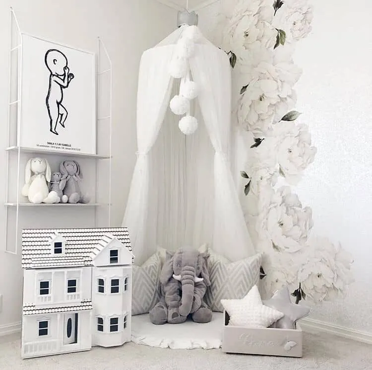 white floral 3D bedroom wall sticker in a kids room with white furnishing