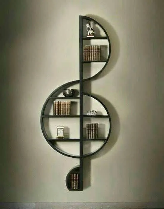 musical note shaped bookcase, books and articles arranged, lighting, black coloured