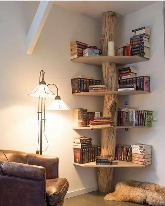 tree shaped book stand, room setting, lampshade, books arranged