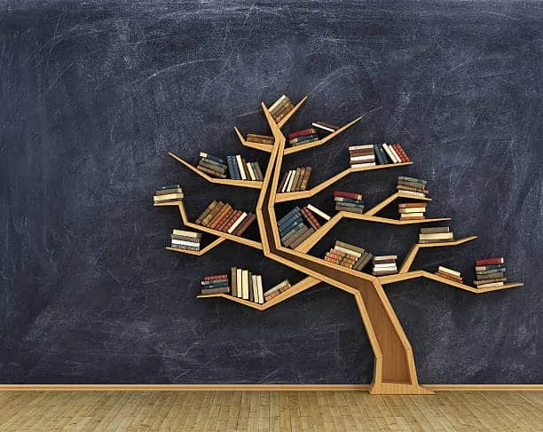 tree shaped bookcase, light brown wooden, black background wall, books