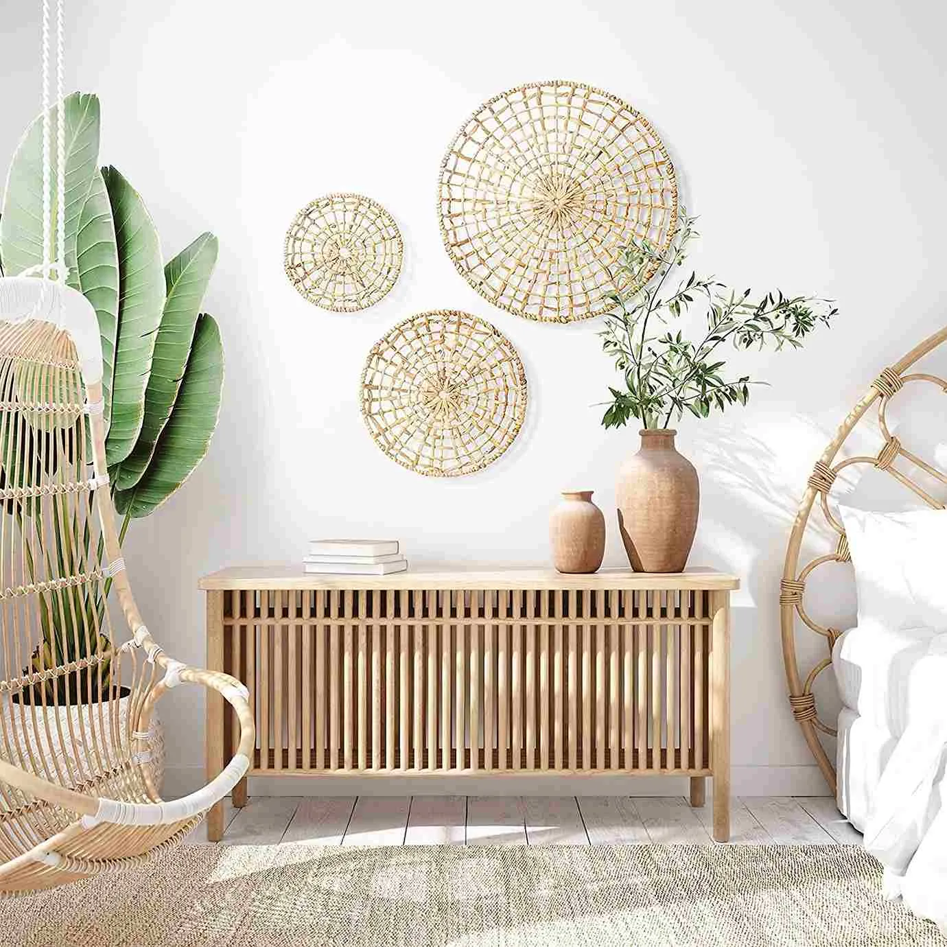 white wall with a backet collection and brown rattan furniture