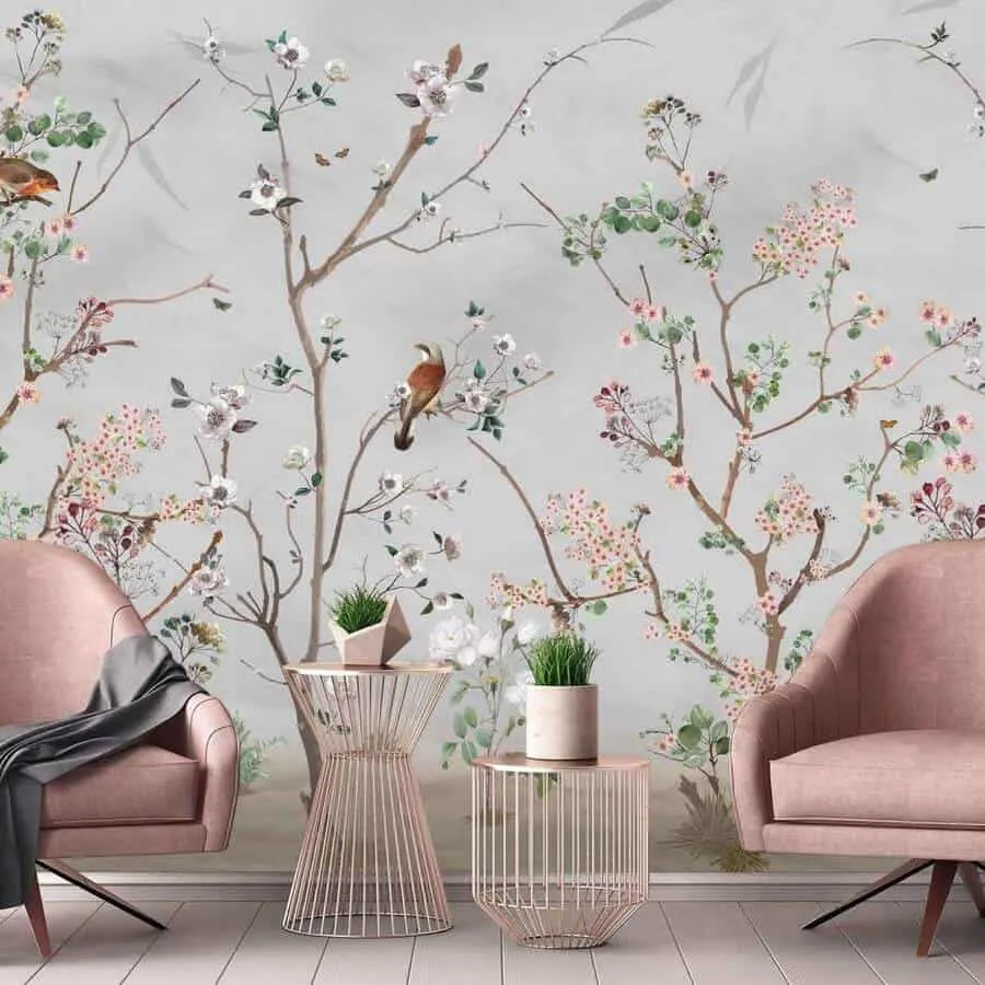 pink chairs with table and a wall sticker floral