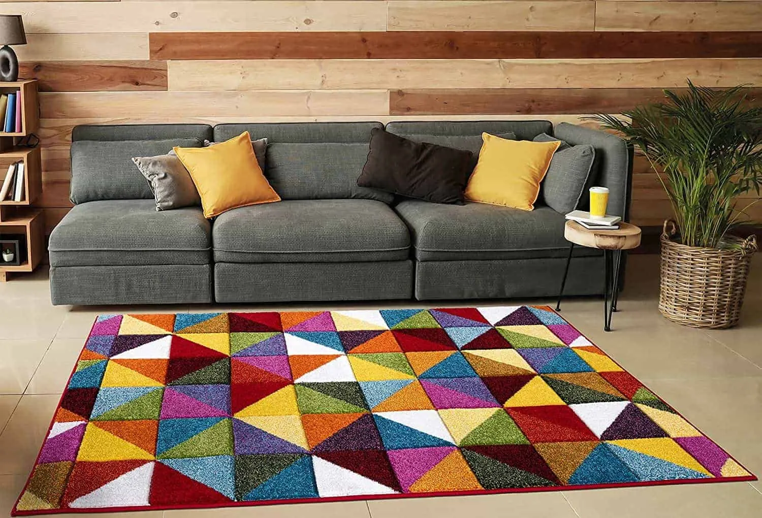 multicolored ground covering with grey sofa