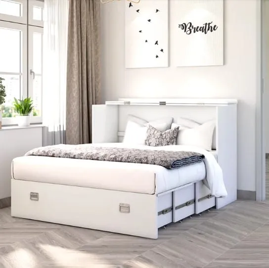 white bedroom furniture, pillows, plants