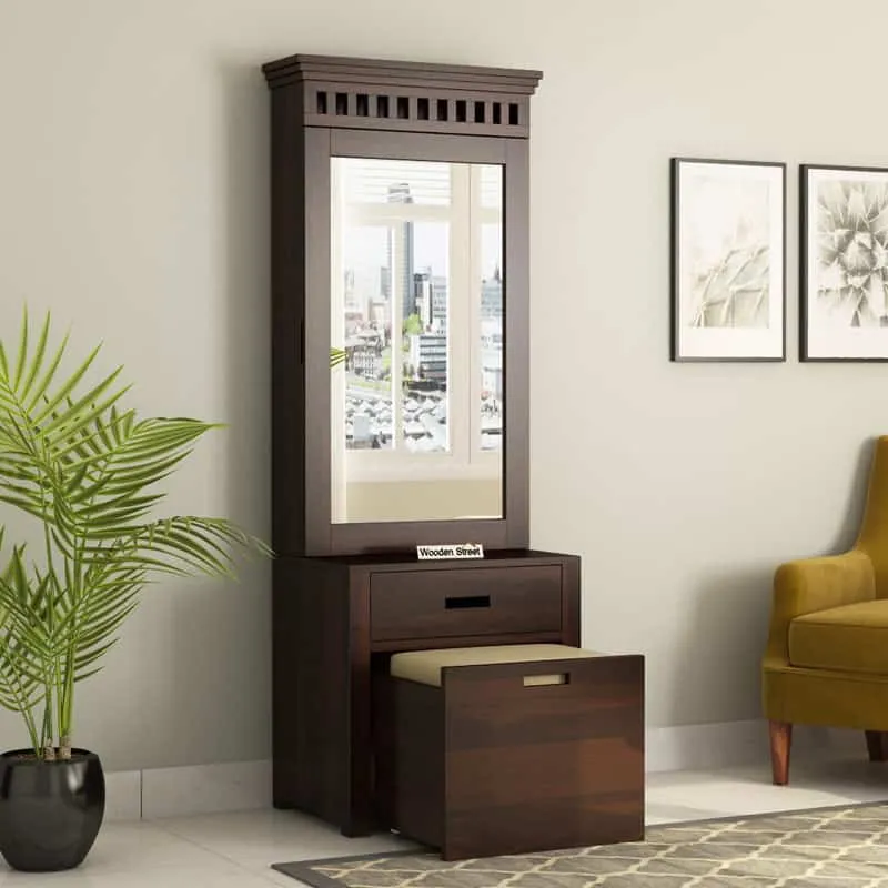 An elegant wooden dressing table design with a rectangular mirror, minimum storage space, and a matching stool, in a white room.