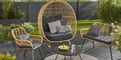 arden and patio chairs and table in home garden