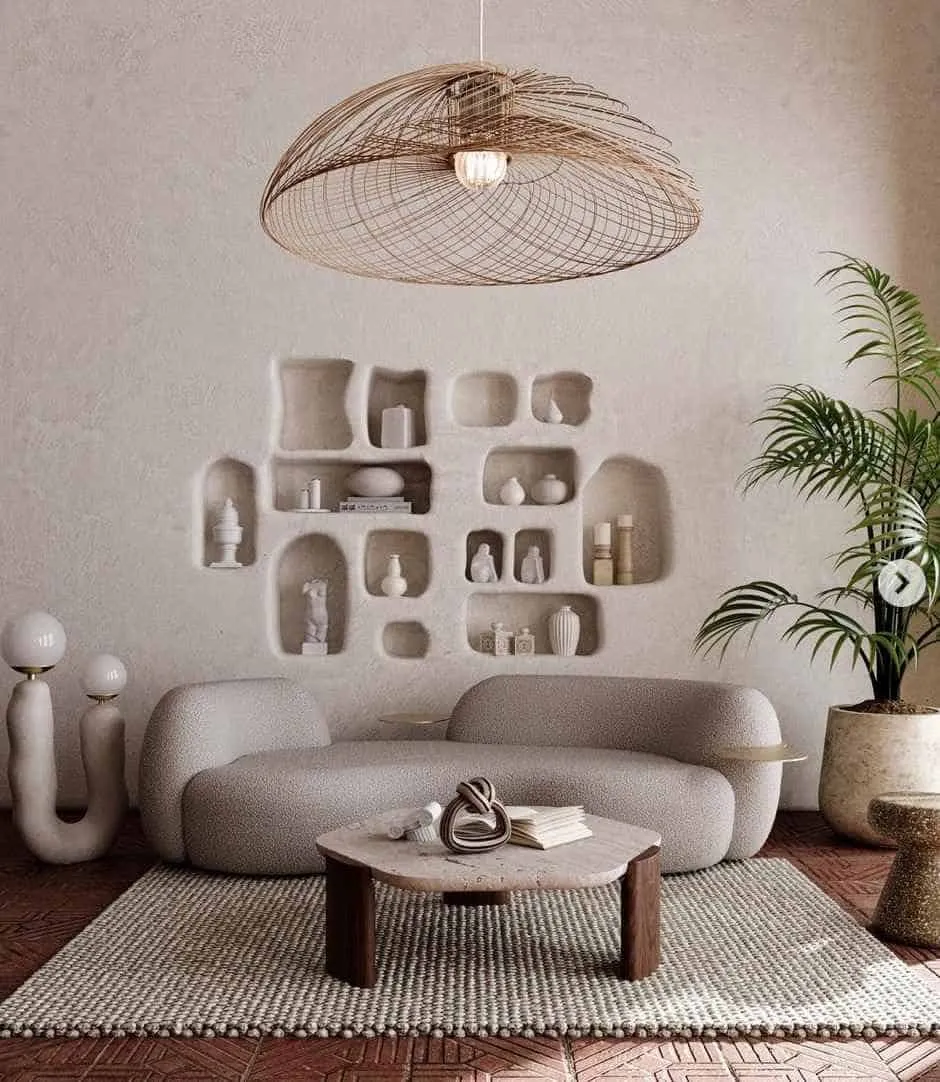 beige sofa with table, lamp and rug