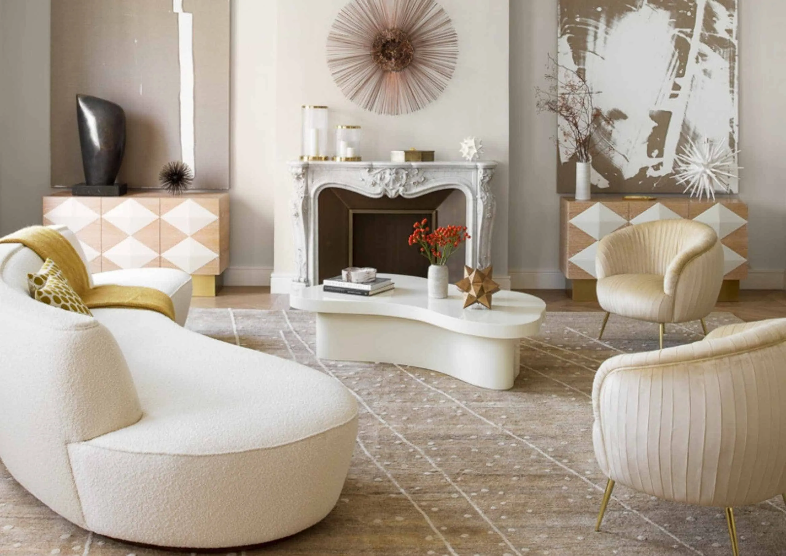 white sofa in a living room with table, fireplace and cabinet