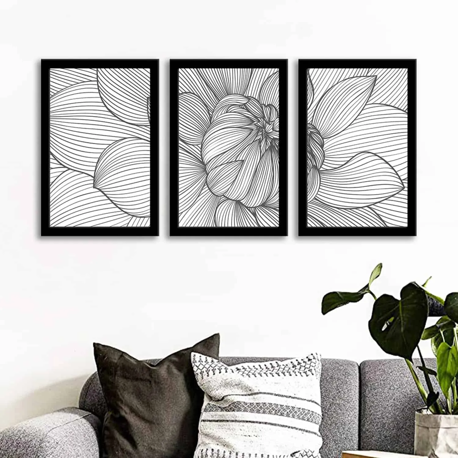 A monochromatic artwork hanged in a living room.