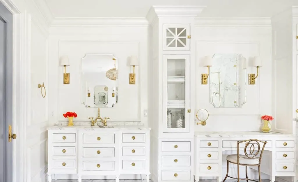 pristine white mirrored vintage vanity for this large bathroom