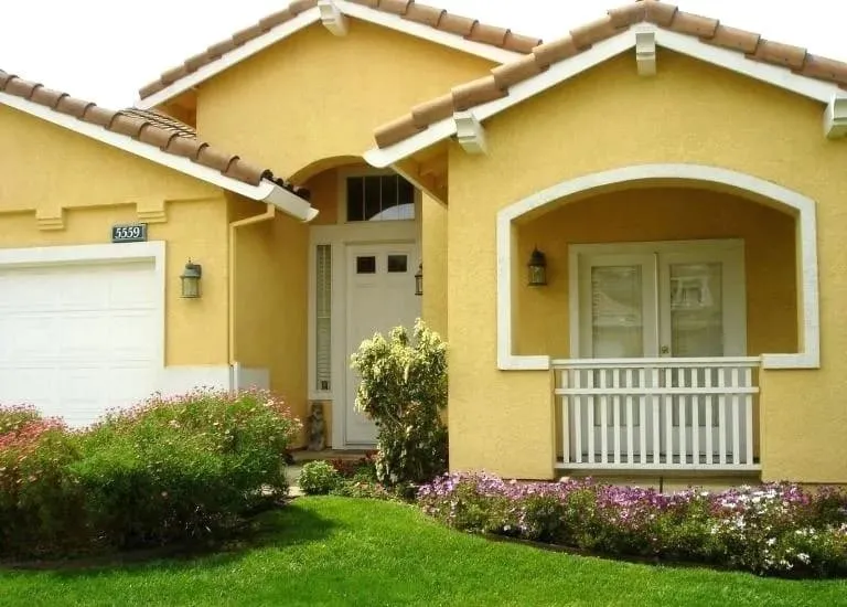bright colour combination of cream and yellow for these houses
