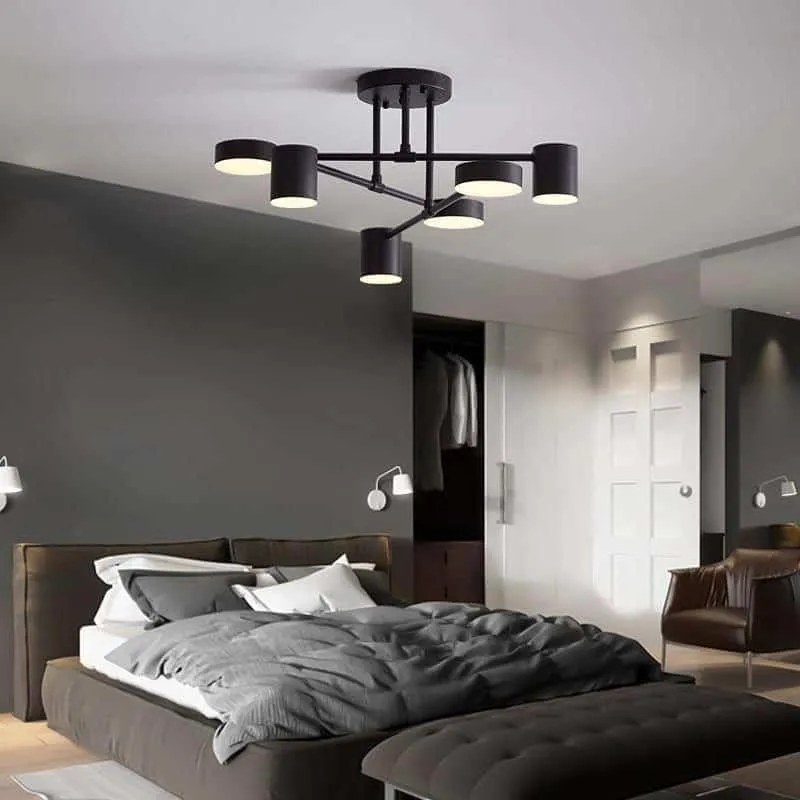 grey bedroom with bed and ceiling lights