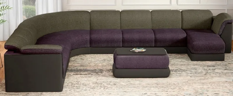 black and purple l shaped sofa with cream carpet and tufted coffee table