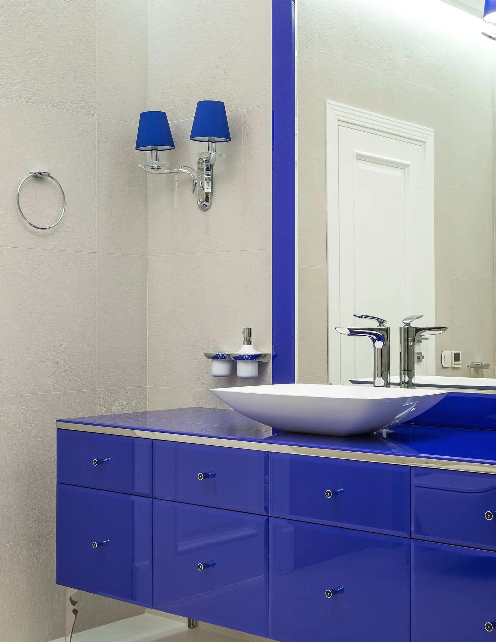 modern small bathroom ideas with wall sconce, royal blue glossy laminates for vanity