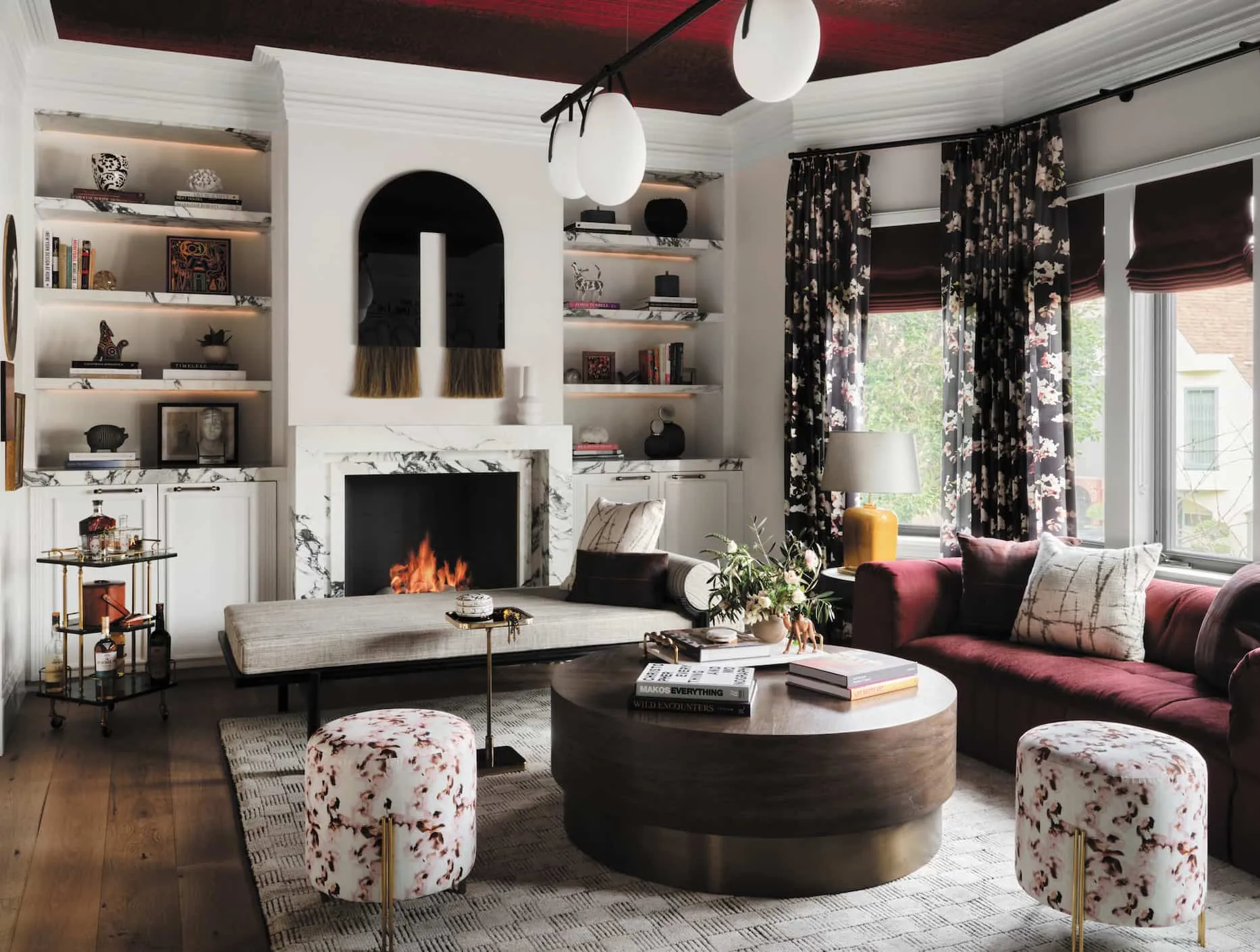 hall decor using collectibles, coffee table, furniture, ceiling lights, fireplace, curtains