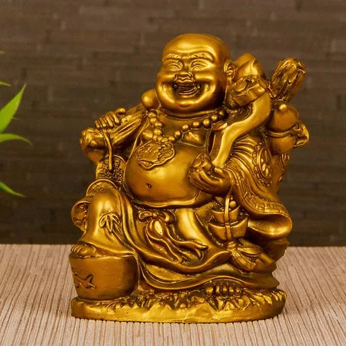 Laughing Buddha in gold colour