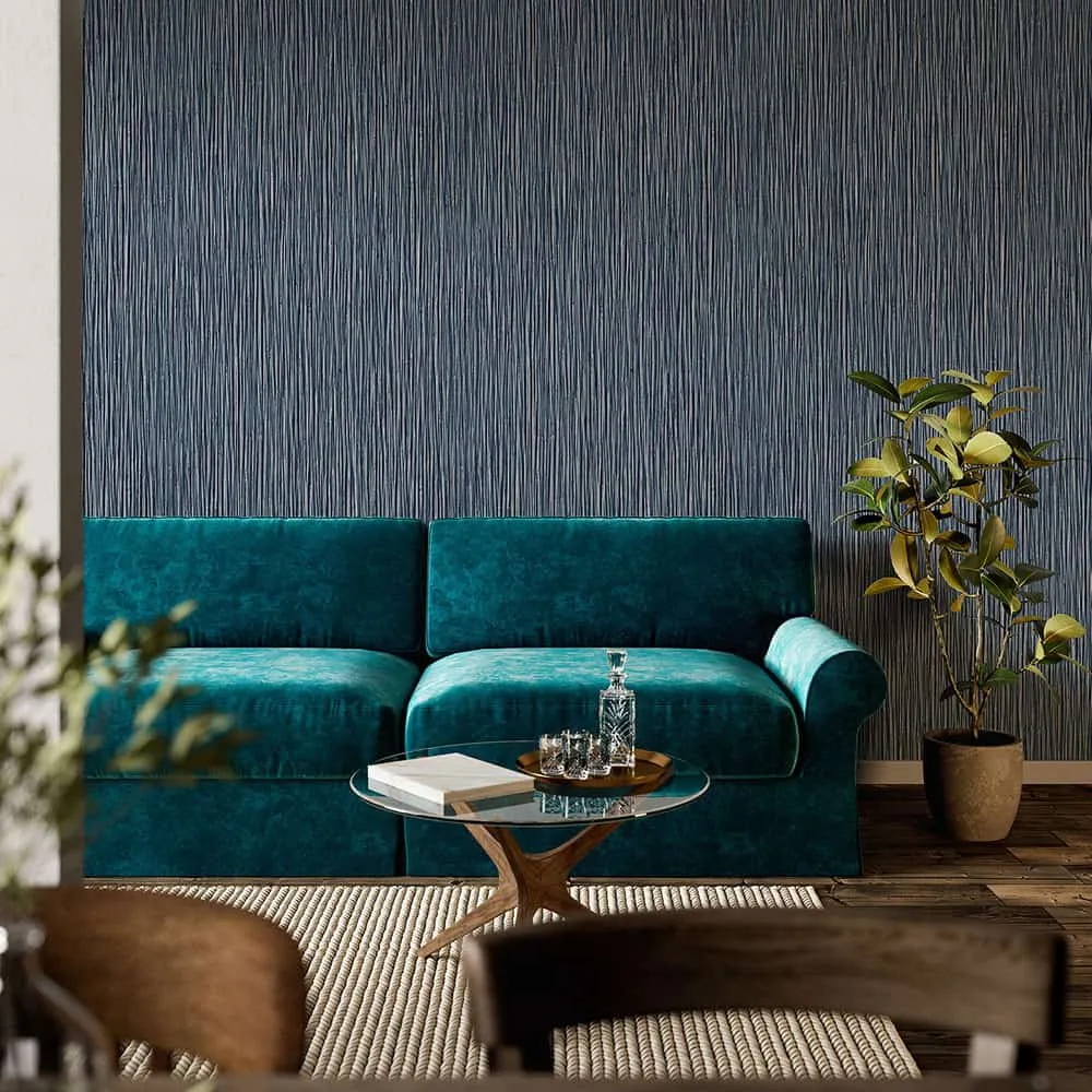 Grasscloth texture on wall along with a beautiful sofa and a plant